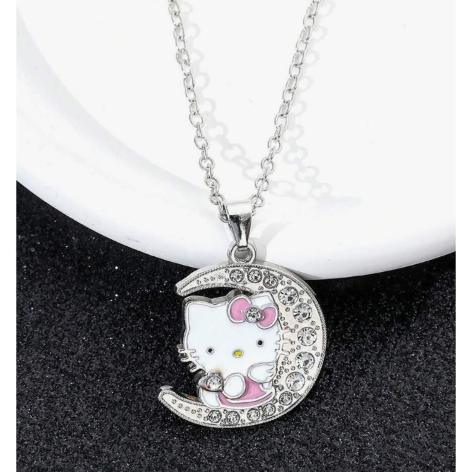 Silver Sanrio Hello Kitty Sitting On A Silver Moon With Crystals 16$